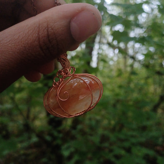 Red quartz pumpkin pendant